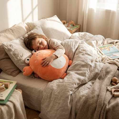 Cuddly plush pillow in use